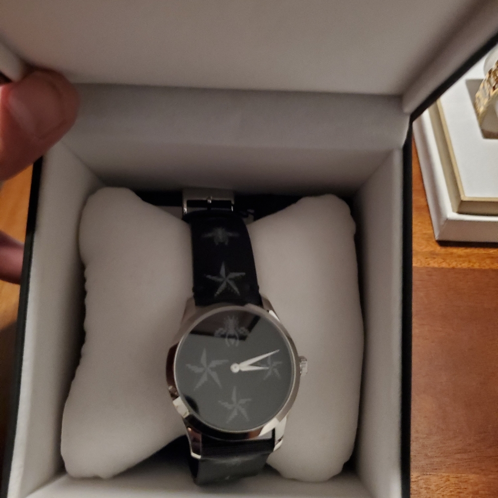 Gucci Hologram beetle watch